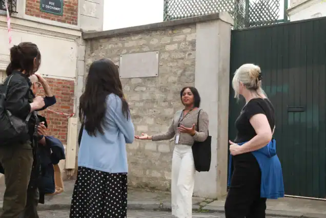 Guests enjoying the Montmartre walking tour with Sacré-Cœur visit on a sunny afternoon