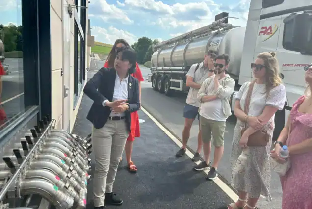 Tour guide showing the champagne warehouse on a day trip from Paris