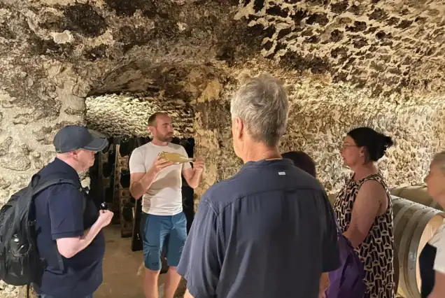 Elegant setup with champagne pairing during a guided day trip from Paris to Champagne region