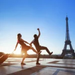 Tourist enjoying Eiffel Tower safely on guided Paris tour