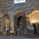 Roman Pris before Notre Dame